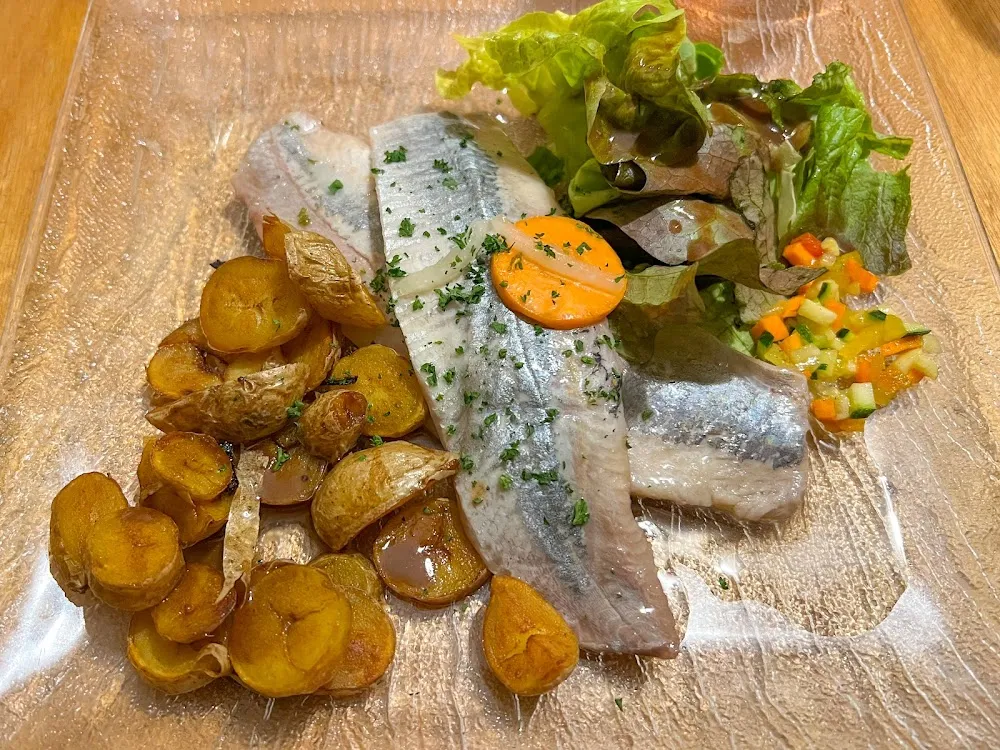 Les Harengs Marinés Pommes À l’huile
