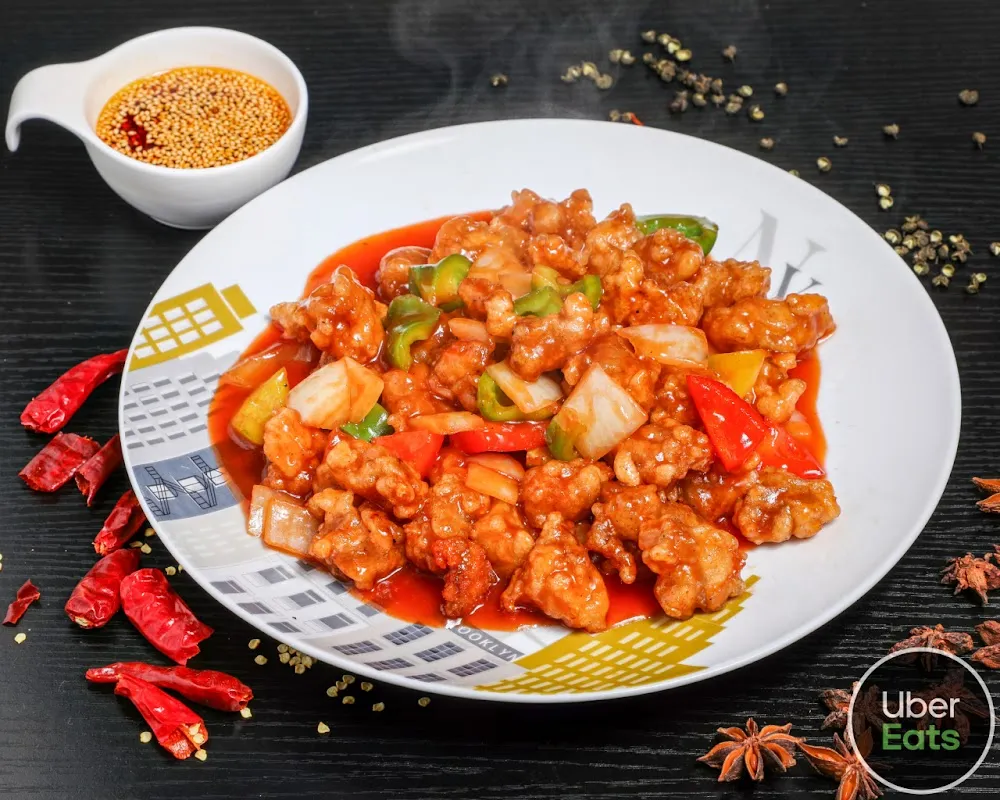 Porc Sauté À la Sauce Aigre-douce 咕咾肉