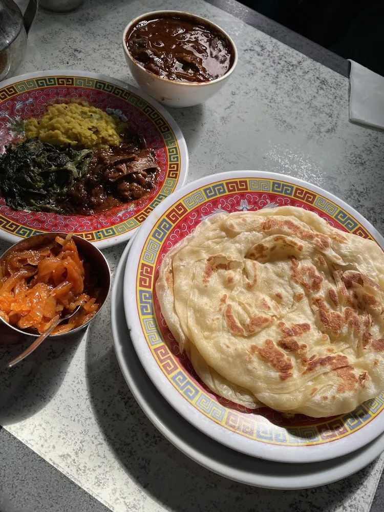 Plat Parotta with Fish Curry