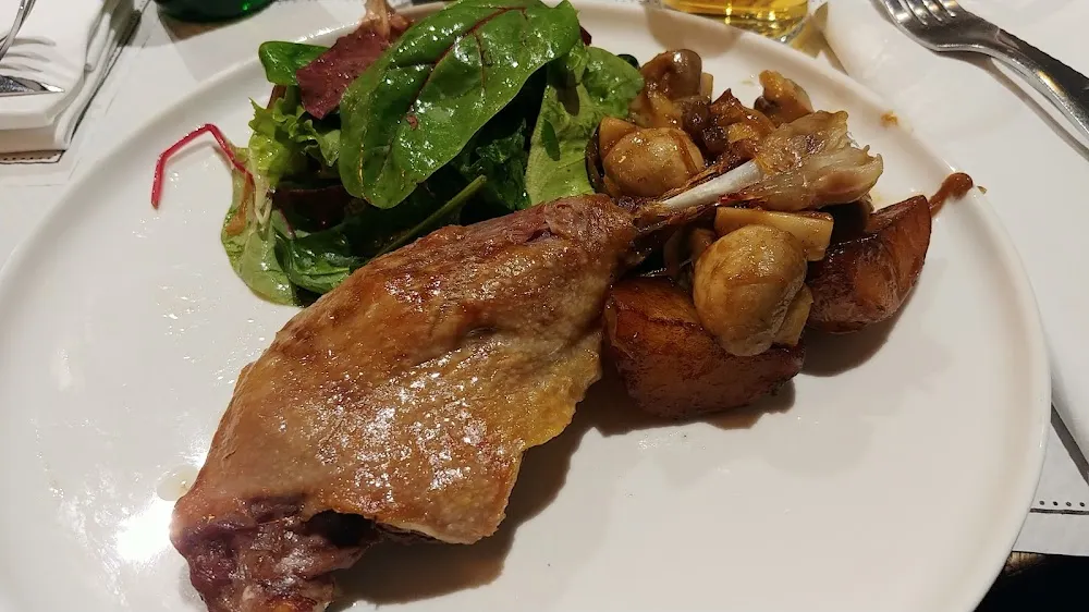 Confit de Pato Con Champiñones